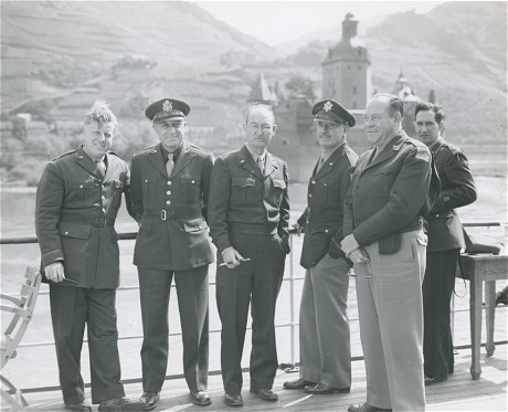 Motion picture execs on a trip up the Rhine River on Hitler's personal yacht, including Eddie Mannix (2nd from right) and Jack Warner (3rd from right)