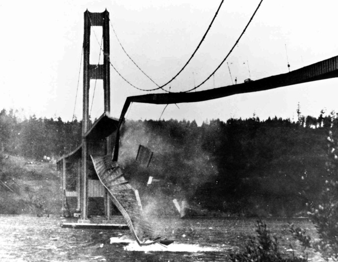 The Tacoma Narrows Bridge crumbles into Puget Sound on Nov. 7, 1940. The fifth-longest suspension bridge in the nation, the original structure know as 'Galloping Gertie' collapsed during a windstorm. It was rebuilt and completed in 1950. A reporter for the Tacoma News Tribune, James Bashford, shot the photo but credit was mistakenly given to a cameraman who shot a 16mm movie film, now a staple in engineering classes, of the unforgettable tumble. (AP Photo/The News Tribune, James Bashford) MANDATORY CREDIT  WATAC1 0307045280 0311429310